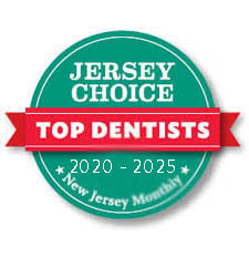 The image displays two badges one for New Jersey Monthly featuring the text Top Dentists and another for Jersey Choice with the title Top Dentists.